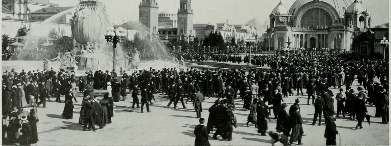 Opening day crowds beneath the Tower of Jewels